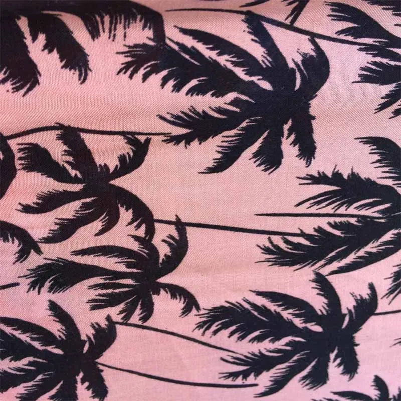 100% Rayon Challis Palm Trees Print On Tuscan Pink Background Soft Tropical Flowy Fabric