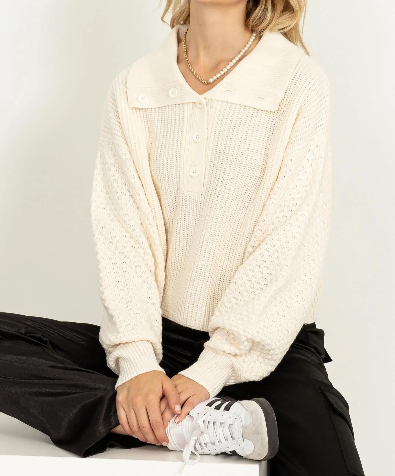 CAYA CABLE KNIT SWEATER